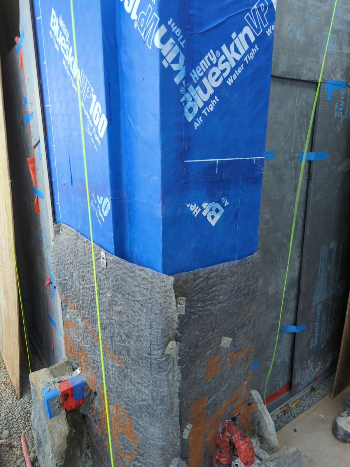 Building wrap and rainscreen installation